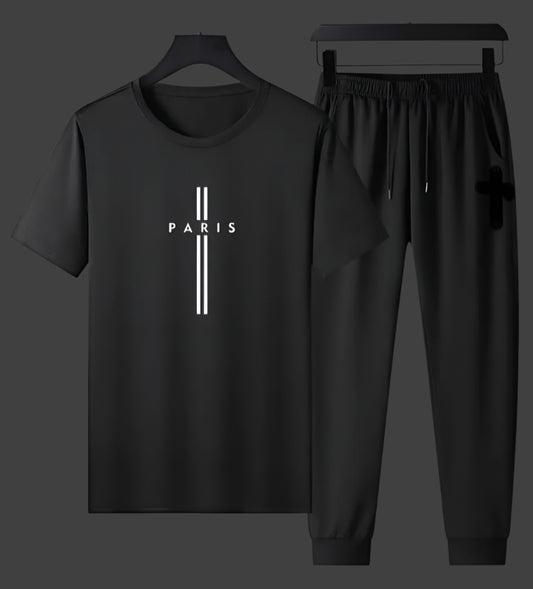 Black t-shirt and pants set with 'PARIS' print on a gray background
